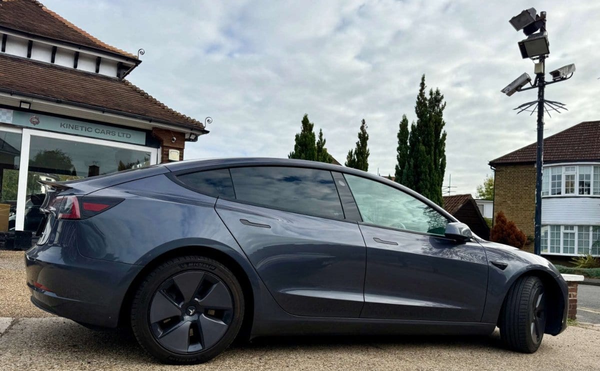 2022 Tesla Model 3 Long Range AWD 4WD 4dr in grey — photo 1 of 35
