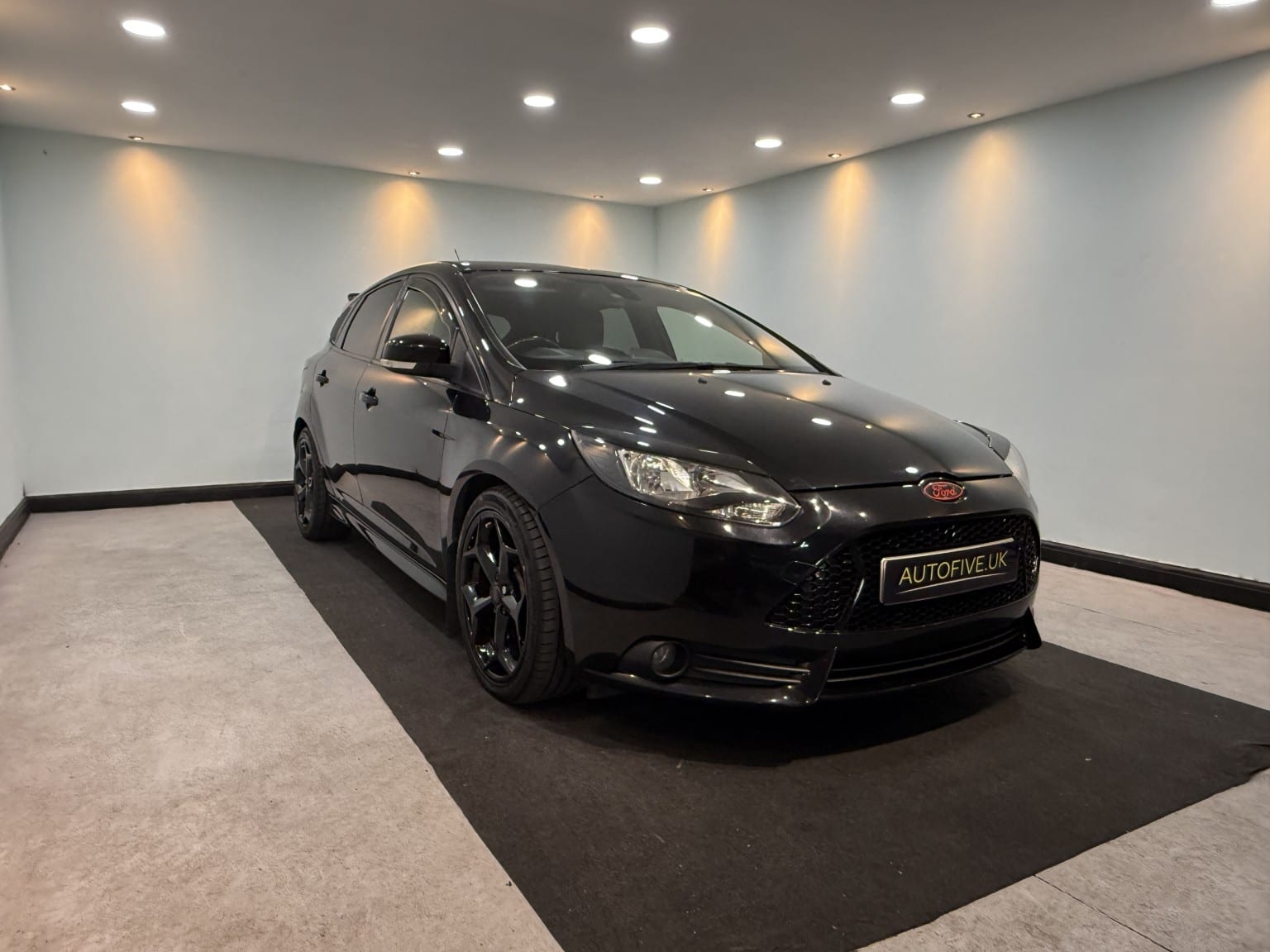 2012 Ford Focus 2.0 T EcoBoost ST-2 in black — photo 1 of 37