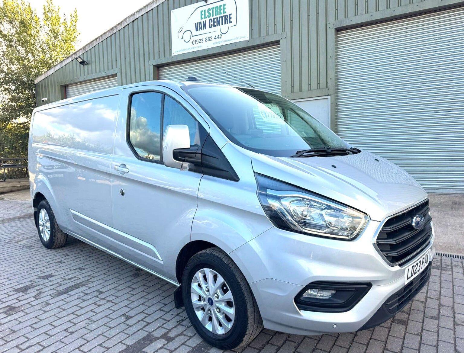2023 Ford Transit Custom 2.0 300 EcoBlue Limited L2 H1 Euro 6 in silver — photo 1 of 32
