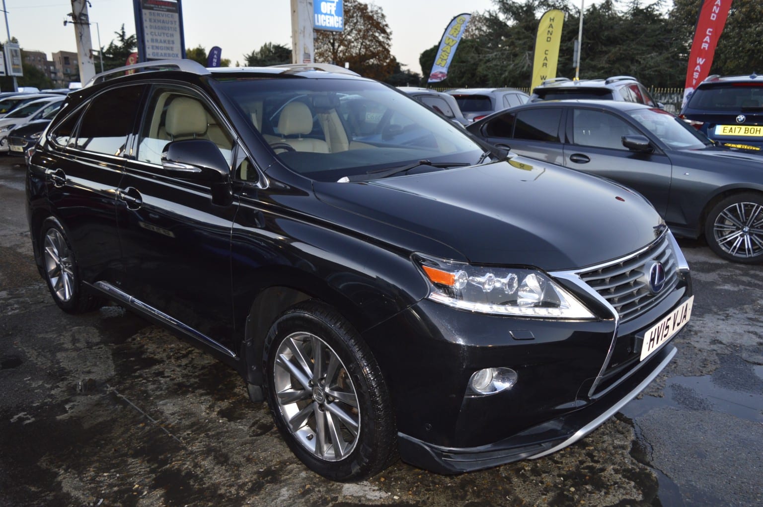 2015 Lexus RX 3.5 450h V6 Premier in black — photo 1 of 28