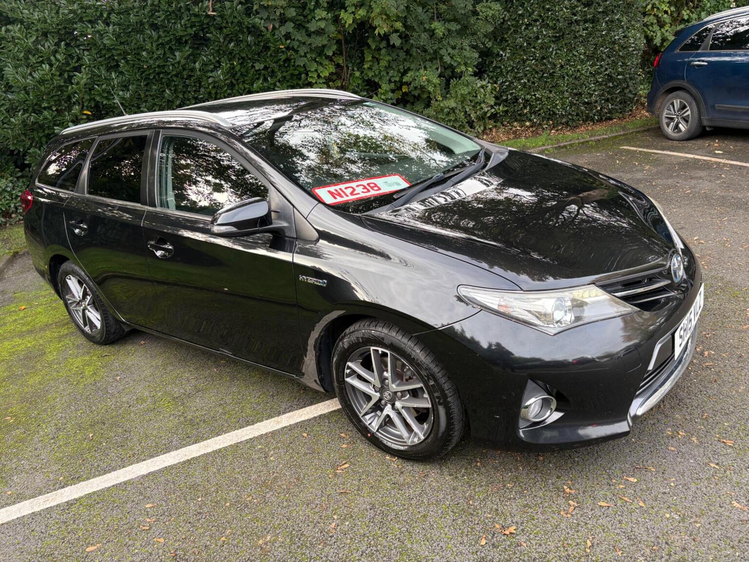 2015 Toyota Auris 1.8 VVT-h Icon+ Touring Sports CVT Euro in black — photo 1 of 35