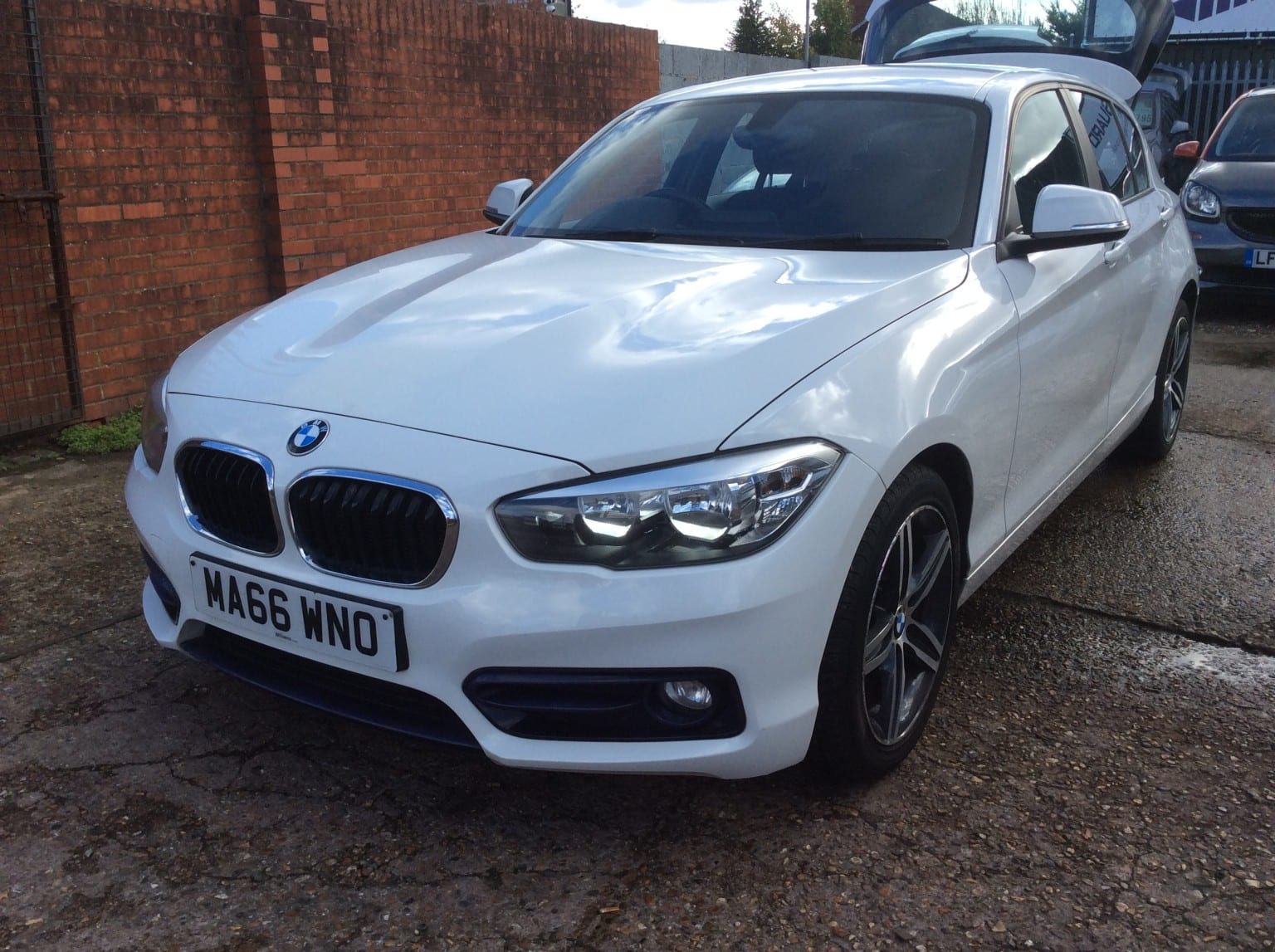 2016 BMW 1 Series 1.5 118i Sport 5-Door in white — photo 1 of 22
