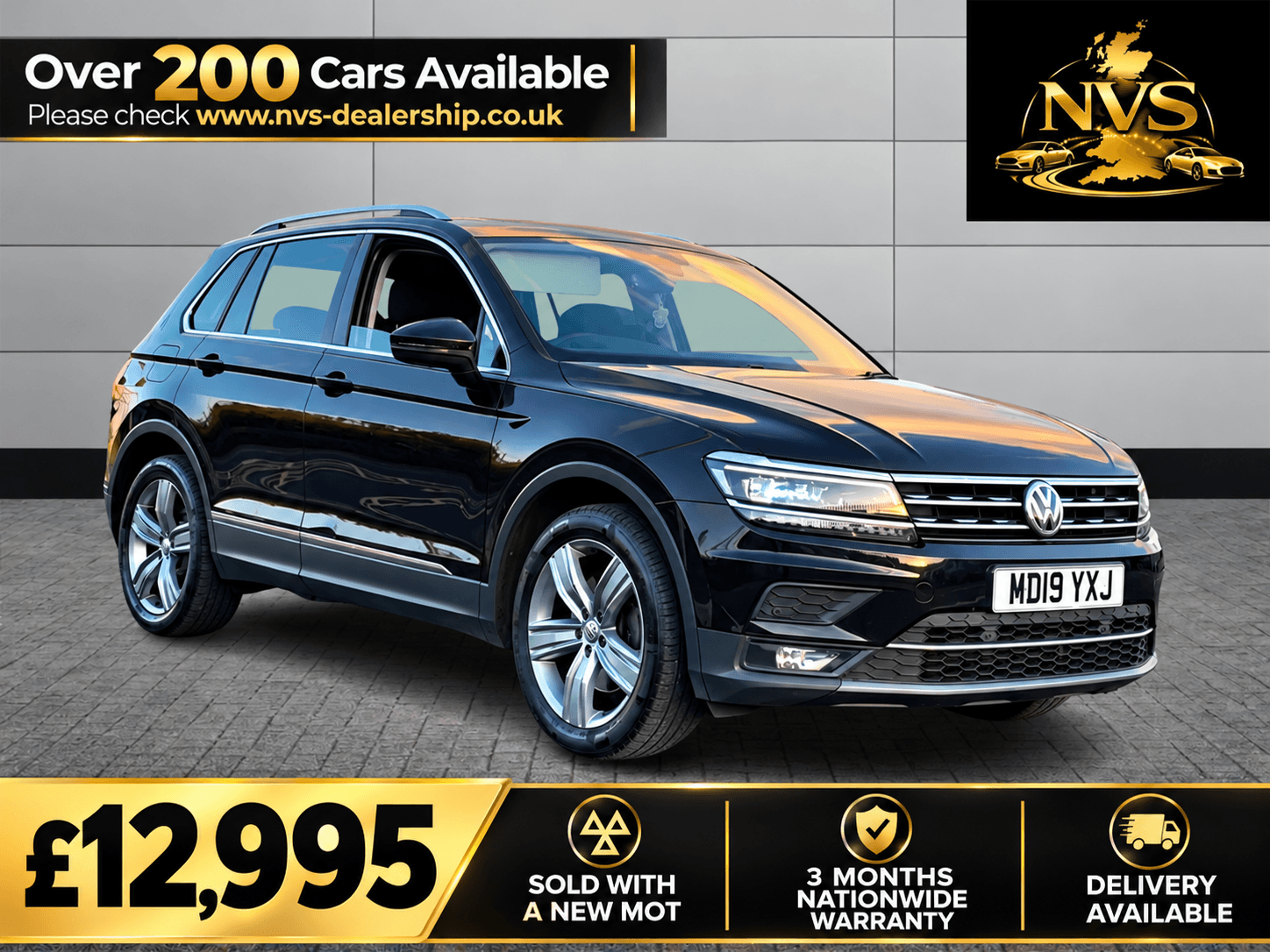 2019 Volkswagen Tiguan 2.0 TSI SEL in black — photo 1 of 12