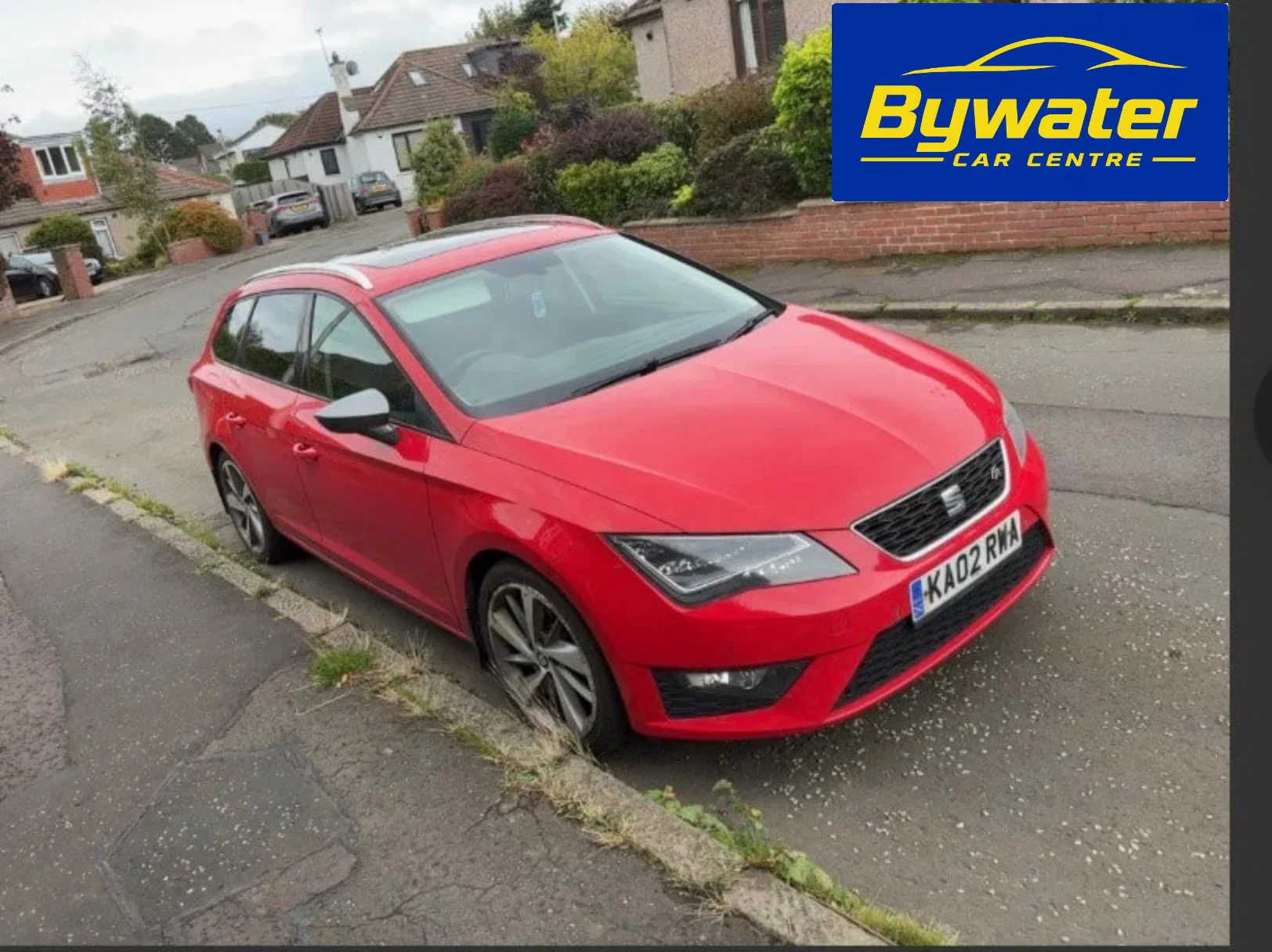 2014 SEAT Leon 2.0 TDI CR FR Sport Tourer 5dr Diesel in red — photo 1 of 5