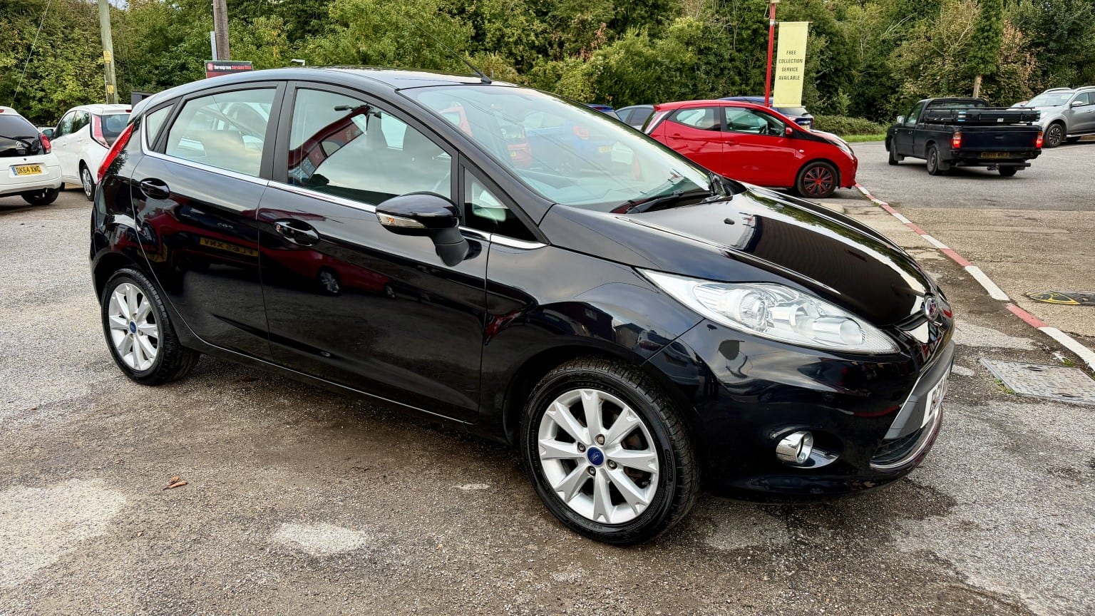 2011 Ford Fiesta 1.4 Zetec in black — photo 1 of 30