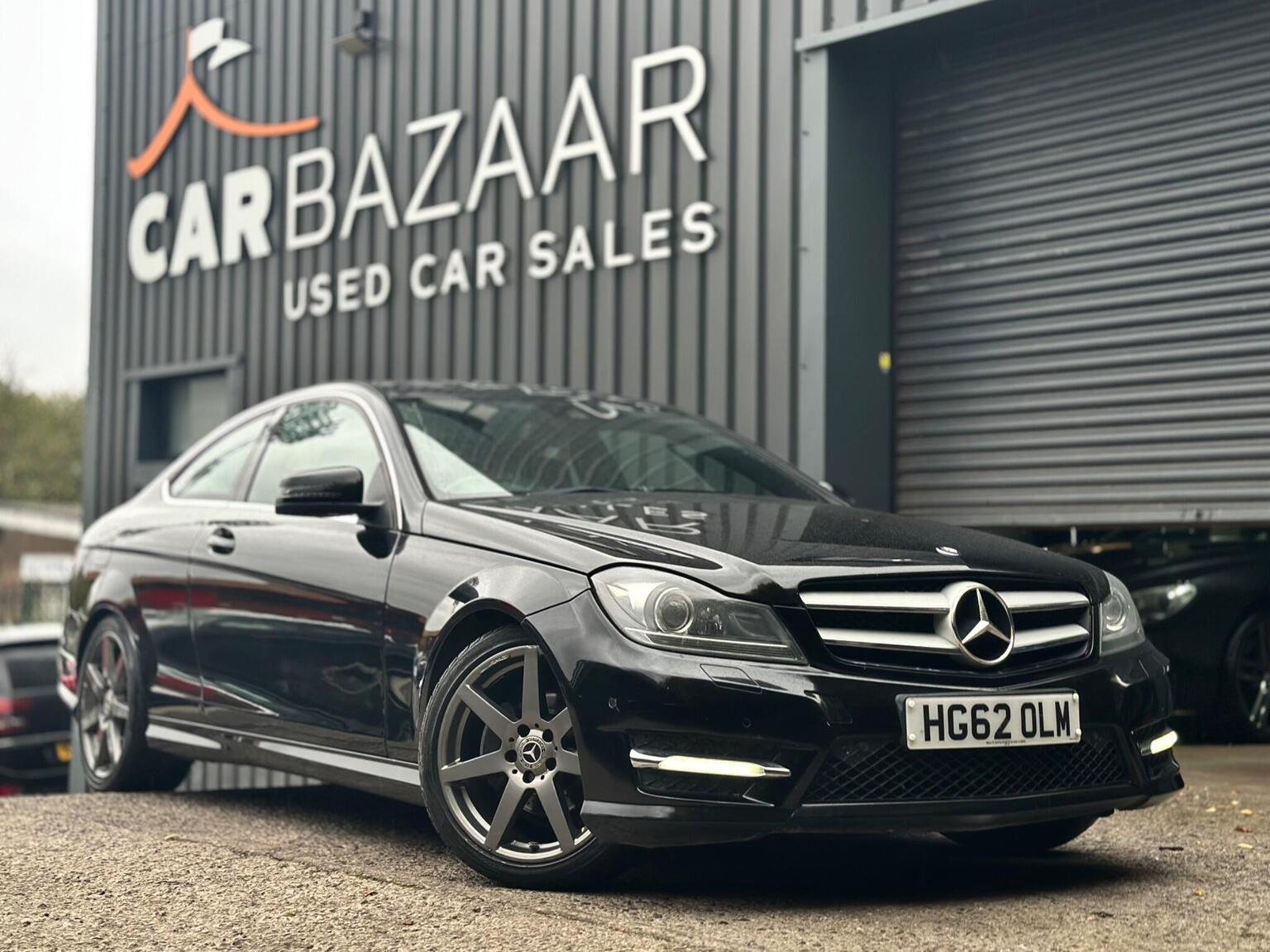 2012 Mercedes-Benz C Class 1.6 C180 BlueEfficiency AMG Sport in black — photo 1 of 62
