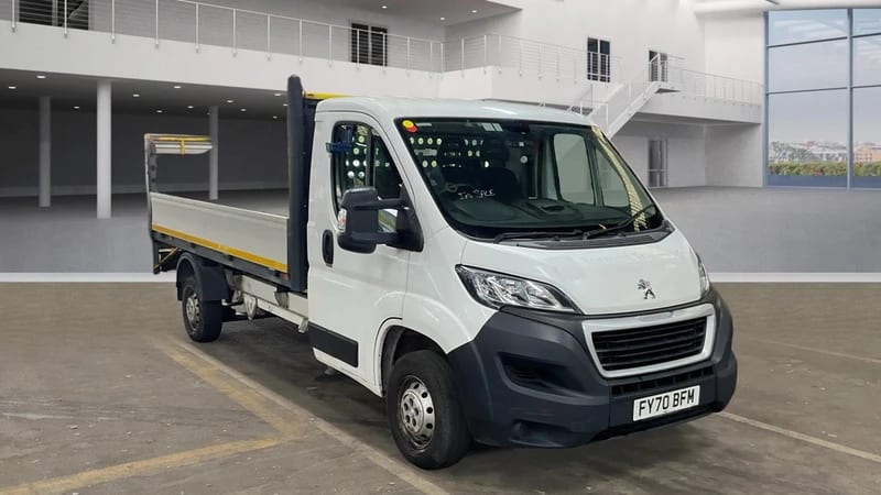 2020 Peugeot e-Boxer Dropside With Tail Lift in white — photo 1 of 9